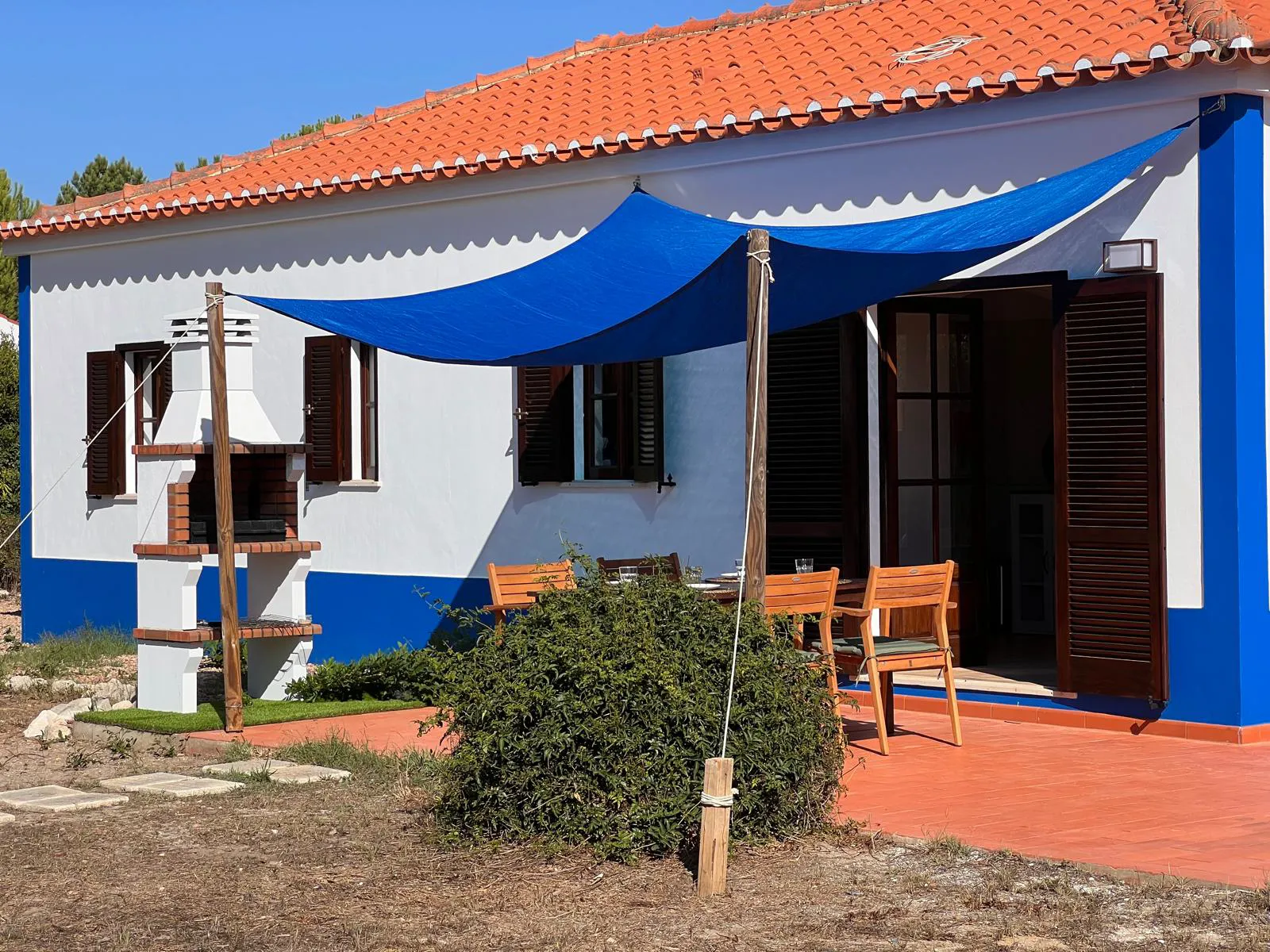 Forest Edge: The villa and its shade sail