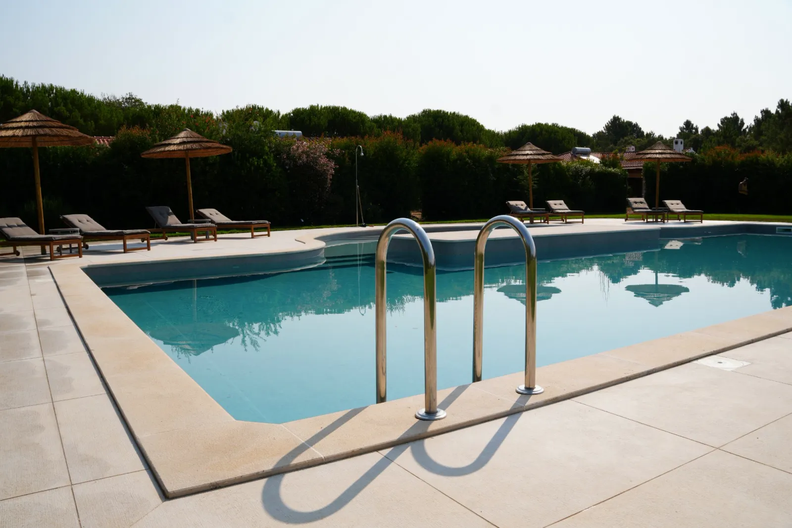The pool steps and still water